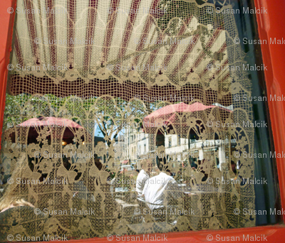 Reflections in a Café Window, French Countryside