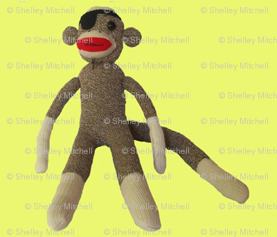 Pirate sock monkey in yellow