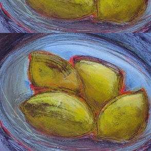 The blue bowl of yellow lemons