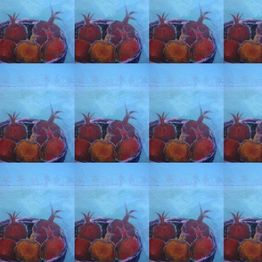 The bowl of red pomegranates