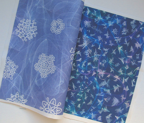 cut paper snow stars in blowing snow