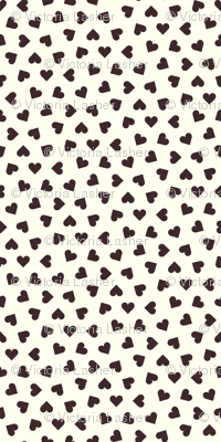 Dark chocolate hearts on cream