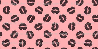 Dark chocolate kisses on strawberry cream