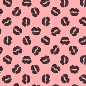 Dark chocolate kisses on strawberry cream