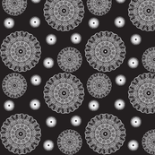 ruffled spirals in white on black