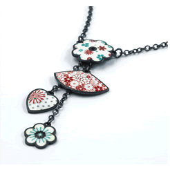 Jane Moore Combining her own distinctive style and exquisite sense of colour she is renowned for practising the ancient art of enamelling, the process of fusing glass to metal.