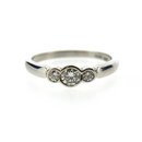 Platinum Brilliant Cut Bezel Set Diamond Trilogy Ring