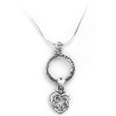 
Aviv Silver Oxidised Hammered Circle with Cut Out Flower Shape Heart Necklace