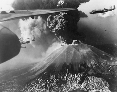 447th Squadron B-25s fly past erupting Vesuvius