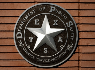 A Texas Department of Public Safety official seal.