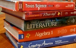 The State Board of Education is scheduled to vote Friday on approving the purchase of new textbooks at a cost of almost half a billion dollars. But state legislators are facing a budget gap of as much as $28 billion in the next biennium, and some observers fear that textbook spending could be on the chopping block. Nathan Bernier of KUT News reports.
