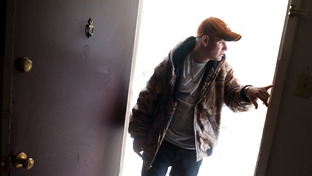 Cameron Maedgen enters his apartment in San Angelo. Maedgen, an autistic, brain-damaged, 19-year-old, is ineligible for state services because his IQ is too high — but too low-functioning to live without assistance.  