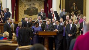 Most of the more than 40 freshman House members gather at the front mic on February 14th, 2013
