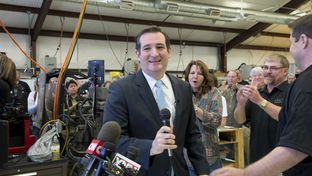U.S. Sen Ted Cruz is welcomed at LaRue Tactical, a gun manufacturer in Leander, by founders Ellen LaRue, center, and Mark LaRue, right, on Feb. 19, 2013.