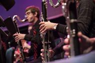 Students of "Wind Ensemble 1," rehearse in the auditorium of Bowie High School in Austin, Texas.