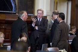 Rep. Jim Pitts, R-Waxahachie speaks with Rep. Todd Hunter R-Corpus Christi and Rep. Abel Herrero D-Robstown on House floor before voting on HB 10 February 21st, 2013