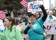 Large group for immigration reform, walks up Congress Ave. towards the Texas Capitol on February 22nd, 2013