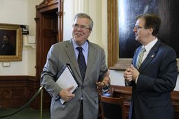 Education consultant and former Florida Gov. Jeb Bush, l, visits with Sen. Dan Patrick, R-Houston, before the Senate Education Committee on Feb. 27, 2013.