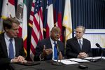 Sen. Rodney Ellis, D-Houston, c, discusses SB 1292 on pre-trial DNA testing March 19, 2013 with Sen. Robert Duncan, l, and Attorney Gen. Greg Abbott.