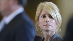 Sen. Wendy Davis, D-Fort Worth, pauses while voicing her objections to SB 1 the state budget bill on March 20, 2013.