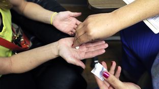 A nurse explains to a patient the effects of taking the abortion pill at Whole Woman's Health Surgical Center in San Antonio, Tuesday, March 19, 2013. Proposed state legislation would create greater restrictions on abortion facilities. Only five of the existing facilities offering abortions would meet the standards.