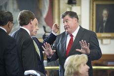 Sen Tommy Williams, R-The Woodlands, negotiates with a group of Senators including Sen. John Whitmire, D-Houston on SB 213 a prison healthcare measure on April 2, 2013.