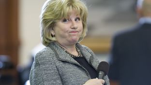 Sen. Jane Nelson, R-Flower Mound, grimaces as she lays out her CPRIT reform bill in the Senate on April 3, 2013.