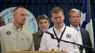 Chief of DPS Emergency Management Nim Kidd, r, answers a question on the West, TX explosion on April 18, 2013.  Left to right are TCEQ head Zac Covar, Gov. Rick Perry, Kidd and Lt. Gov. David Dewhurst.