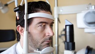 Dr. Susan Shauger performs a routine eye exam on Josh Fish at Lakeline Vision Source. A bill backed by optometrists to give them more negotiating power with health insurers, could force customers to lose discounts on services outside their insurance policy’s coverage.