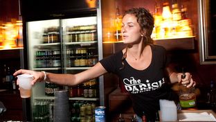 Lindsey Sunflower serves drinks at The Parish, a popular music venue in Austin, Texas. State Rep. Mark Strama is pursuing a bill that would cut the tax on mixed beverages charged to bars if they prove they are using the savings to present live music.