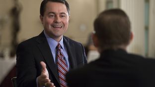 Evan Smith talks with Agriculture Commissioner Todd Staples during a TribLive event on May 2, 2013.