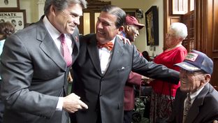 Gov. Perry along with his father Ray Perry and Sen. Eddie Lucio D-Brownsville on Senate floor where WW2 veterans were honored during a ceremony commemorating VE Day.