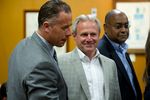 Michael Morton, at the Williamson County Courthouse on April 19, 2013, stands with state Sen. Rodney Ellis, D-Houston, an author of the Senate Bill 1611, and Ellis' chief of staff, Brandon Dudley, who also worked on the legislation.
