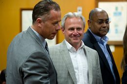 Michael Morton, at the Williamson County Courthouse on April 19, 2013, stands with state Sen. Rodney Ellis, D-Houston, an author of the Senate Bill 1611, and Ellis' chief of staff, Brandon Dudley, who also worked on the legislation.