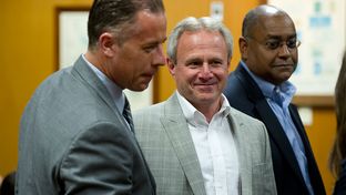 Michael Morton, at the Williamson County Courthouse on April 19, 2013, stands with state Sen. Rodney Ellis, D-Houston, an author of the Senate Bill 1611, and Ellis' chief of staff, Brandon Dudley, who also worked on the legislation.