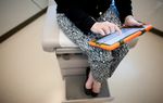 Village Health Partners in Plano, Texas uses an iPad to screen for mood disorders.