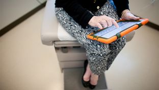 Village Health Partners in Plano, Texas uses an iPad to screen for mood disorders.