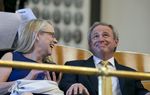 Michael Morton, r, and wife Cynthia watch the House proceedings in the gallery on May 13, 2013.