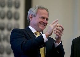 Michael Morton cheers the unanimous passage of SB 825 in the Texas House on May 13, 2013.