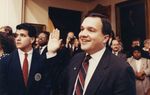 State Rep. John Carona holds up his right hand during his first swearing-in ceremony for the 72nd Legislature on January 8, 1991.