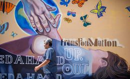 Isaias Garcia, 60, passes a mural at Haven for Hope of Bexar County, a community-based mental health care provider and transformational center for homeless men and women. It has been discussed among lawmakers as a model for providing mental health care across the state.