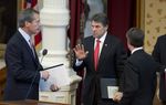 Gov. Rick Perry, c, talks with Lt. Gov. David Dewhurst and House Speaker Joe Straus after a military memorial ceremony in the Texas House chamber on May 25, 2013.
