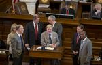 Chairman State Rep. Jim Pitts, R-Waxahachie, c, explains the budget bills while Appropriations Committee members listen on May 26, 2013.