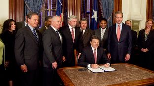 Texas Governor Rick Perry ceremonially signed House Bill 4, which lays the foundation for Texas' future water needs. He is joined by Lt. Gov. David Dewhurst, Speaker Joe Straus, Rep. Allan Ritter, R-Nederland and Sen. Troy Fraser, R-Horseshoe Bay on May 28, 2013