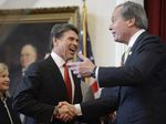 Gov. Rick Perry, left, and Lt. Gov. David Dewhurst at Perry's State of the State address on Jan. 29, 2013.