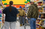 East Texas residents shop in a grocery store.