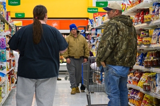 East Texas residents shop in a grocery store.