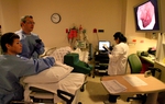 Dr. Carlos Cardenas, chairman of the board at Doctor’s Hospital at Renaissance in Edinburg, performs an exam on a patient on Wednesday December 8, 2010. Many Texas hospitals like this one oppose certain aspects of the proposed expansion of Medicaid managed care.