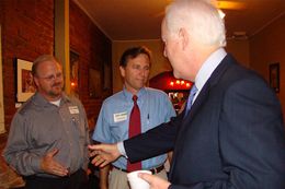 John Higgins, chief of staff to state Rep. Tim Kleinschmidt, can be seen on the far left of this photo with U.S. Sen. John Cornyn. The Travis County District Attorney's Public Integrity Unit is investigating Higgins in relation to alleged improprieties involving travel reimbursements.