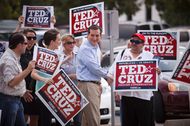 Republican Senate candidate Ted Cruz greets supporters outside a polling station in Houston, Tuesday, July 31, 2012.
